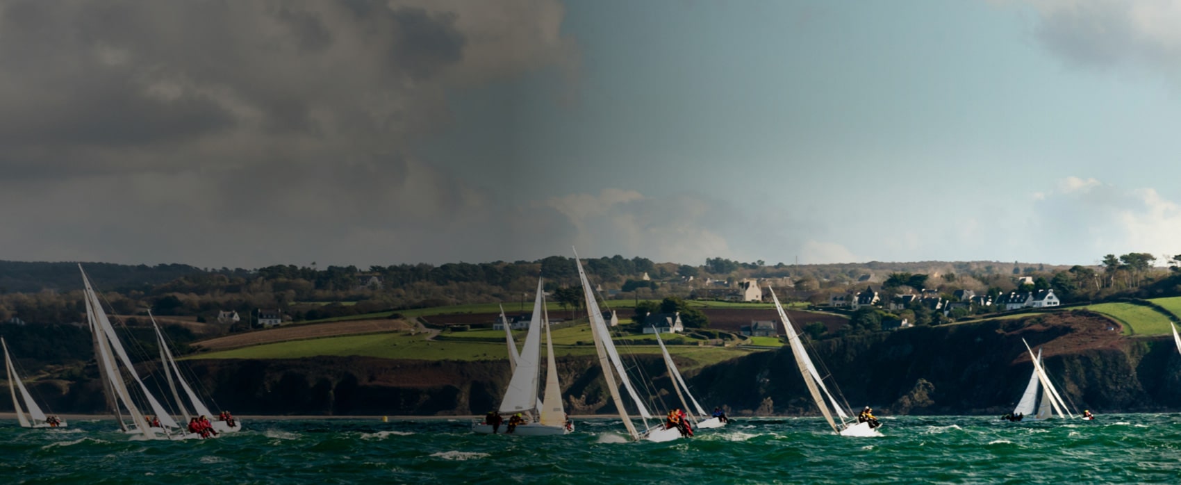 Multiple sailing boats in the water